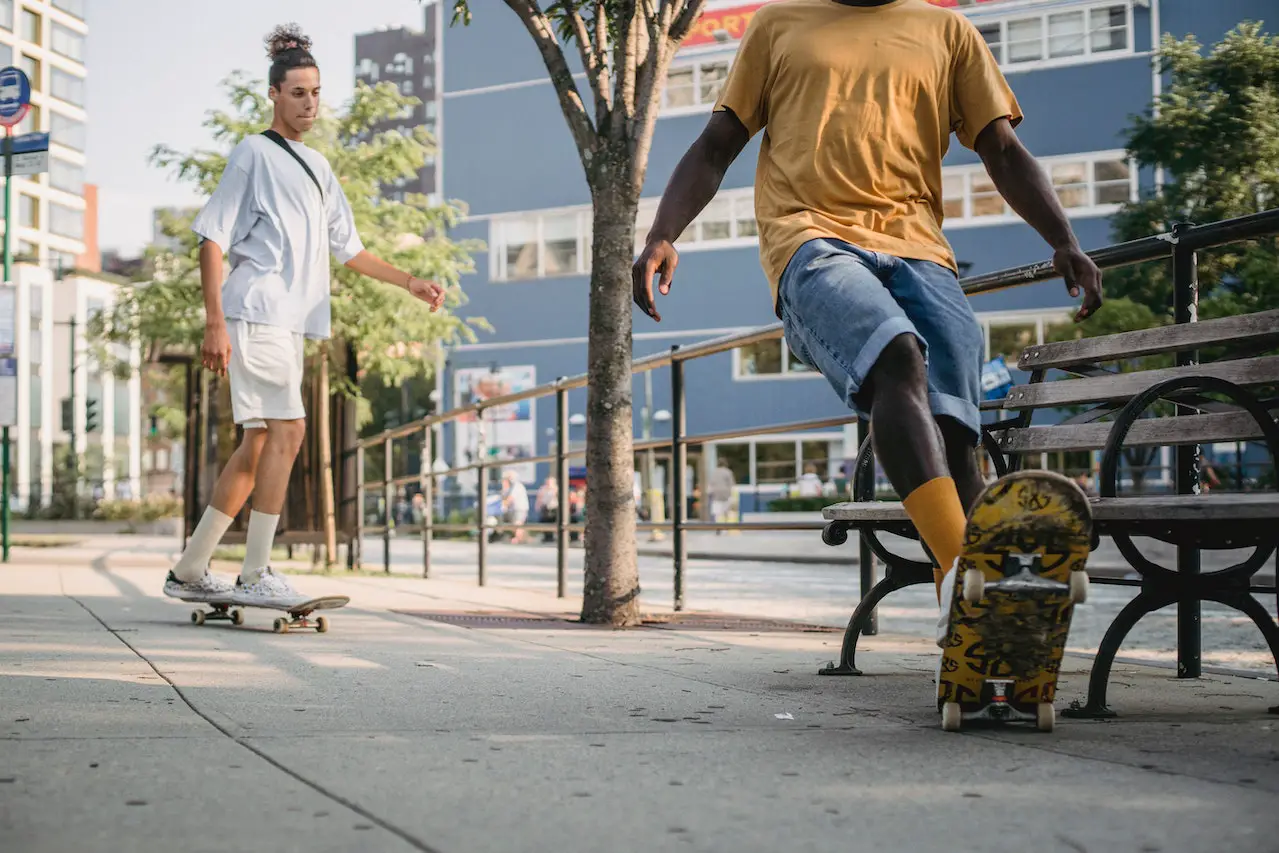 Image someone skateboarding on a sidewalk. Source: budgeron bach, pexels