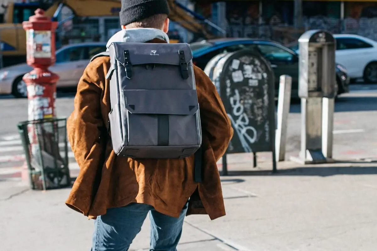 Skateboarder wearing a skateboarding backpack in new york city. Source: pexels