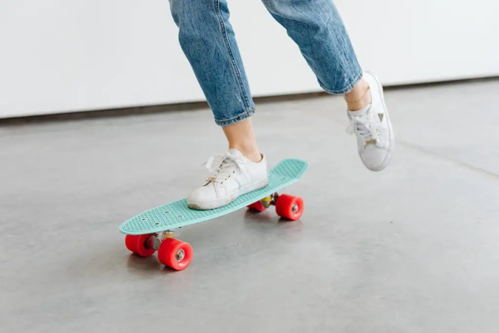 Image of a woman riding a penny board. Source: pixabay