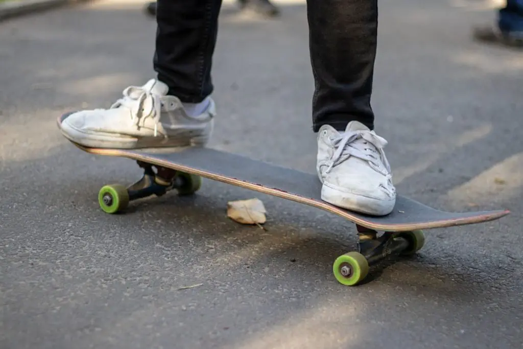 Image of a skateboard on concrete pavement. Source: max pixel
