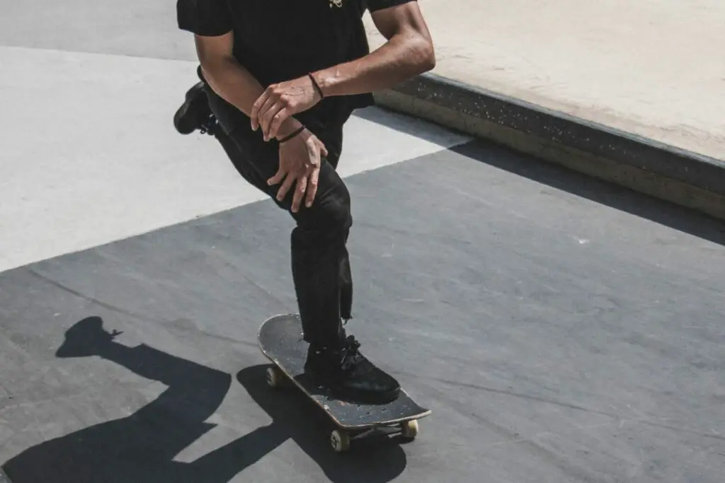 Image of a man while skateboarding.