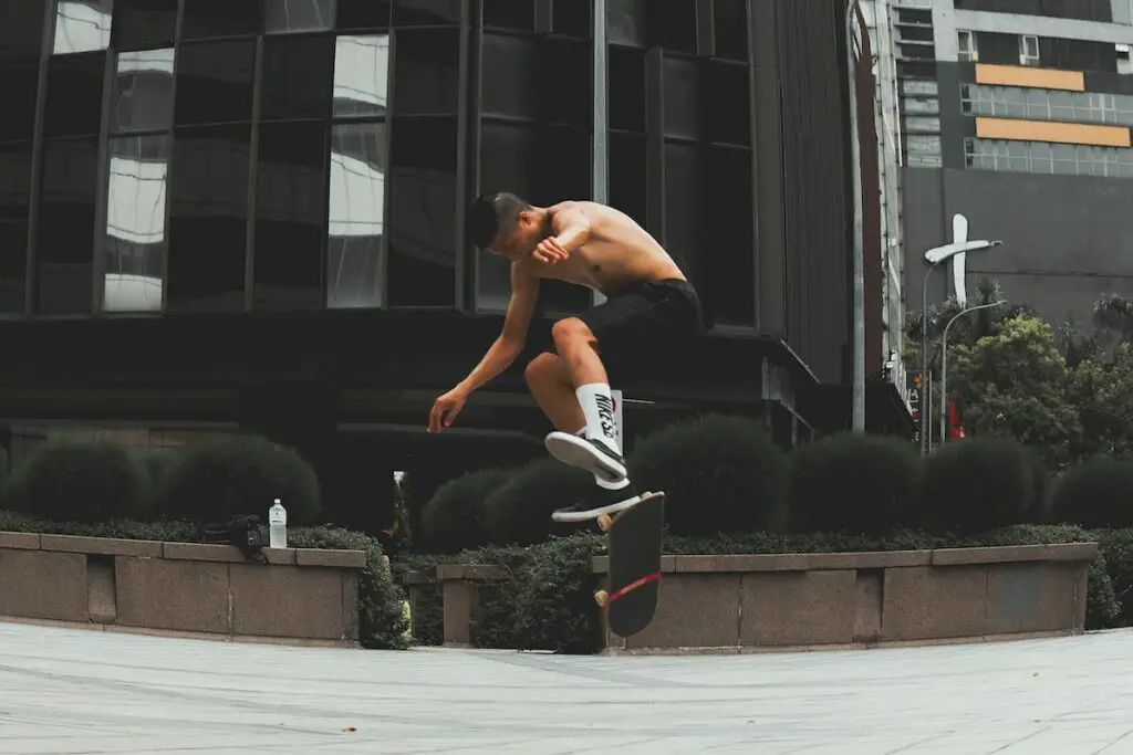 Image of a skater doing a flip with his skateboard. Source: pexels