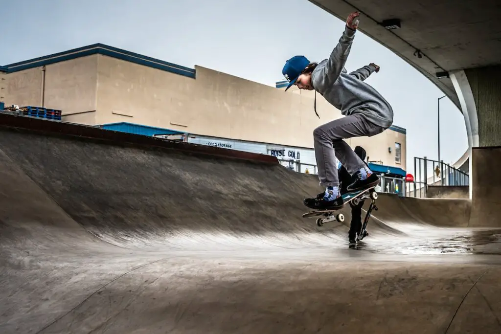 Image of a skater doing tricks in a skate park. Source: pexels