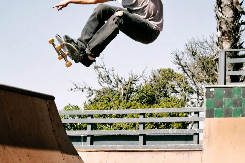 Image of a skater practicing on a vert ramp. Source: pexels