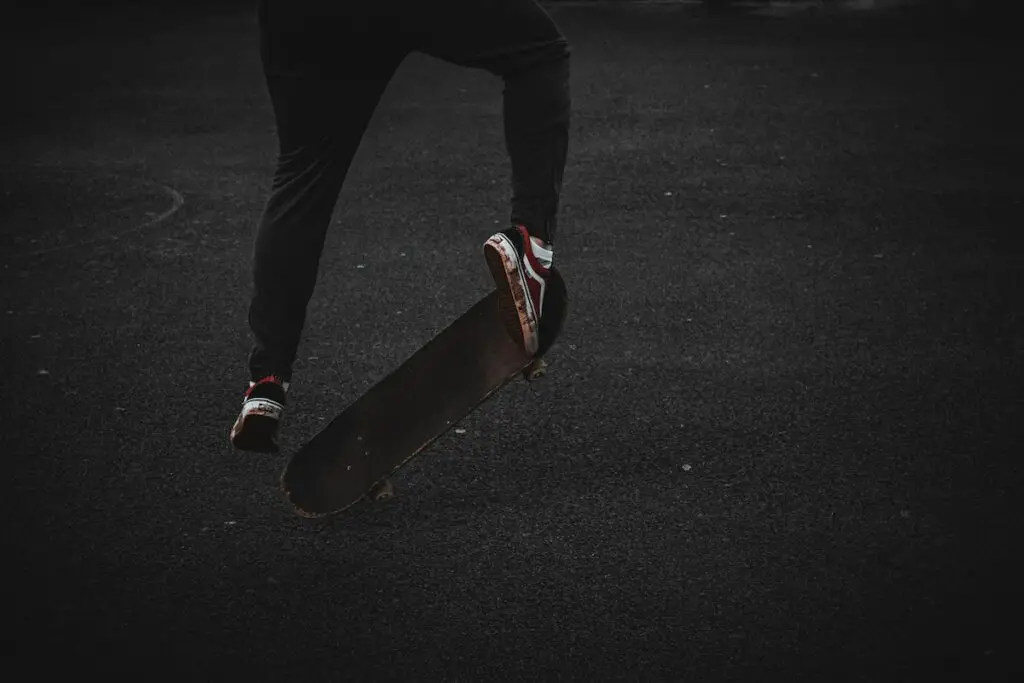 Image of a skater wearing vans old skool pros. Source: pexels