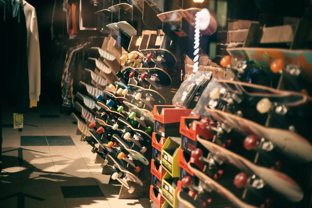 Image of skateboards on a rack of a skate shop. Source: pexels