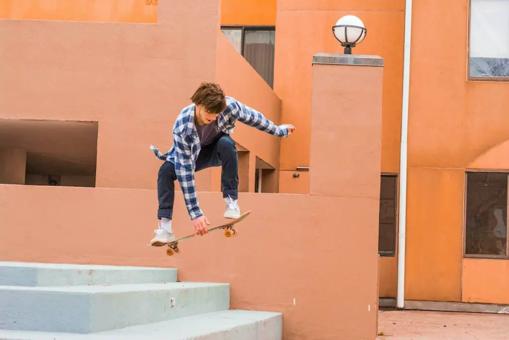 Image of a skater riding a skateboard midair. Source: pexels