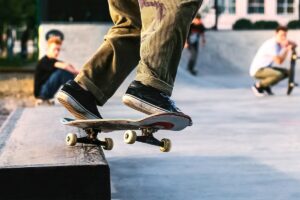 10 Pro Tips to Make Your Skate Shoes Last Longer: Ultimate Guide to Durability | image of a skater wearing Vans while riding a skateboard. Source Pexels | Skateboard Salad
