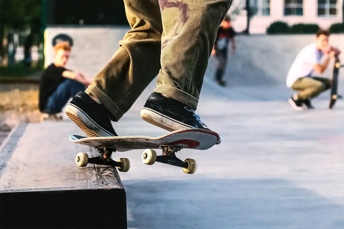 10 pro tips to make your skate shoes last longer: ultimate guide to durability | image of a skater wearing vans while riding a skateboard. Source | skateboard salad