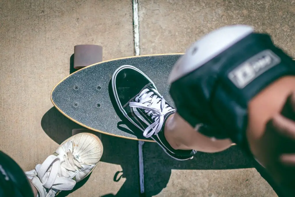 Image of a skater wearing suede vans skateshoes while riding the skateboard. Source: pexels