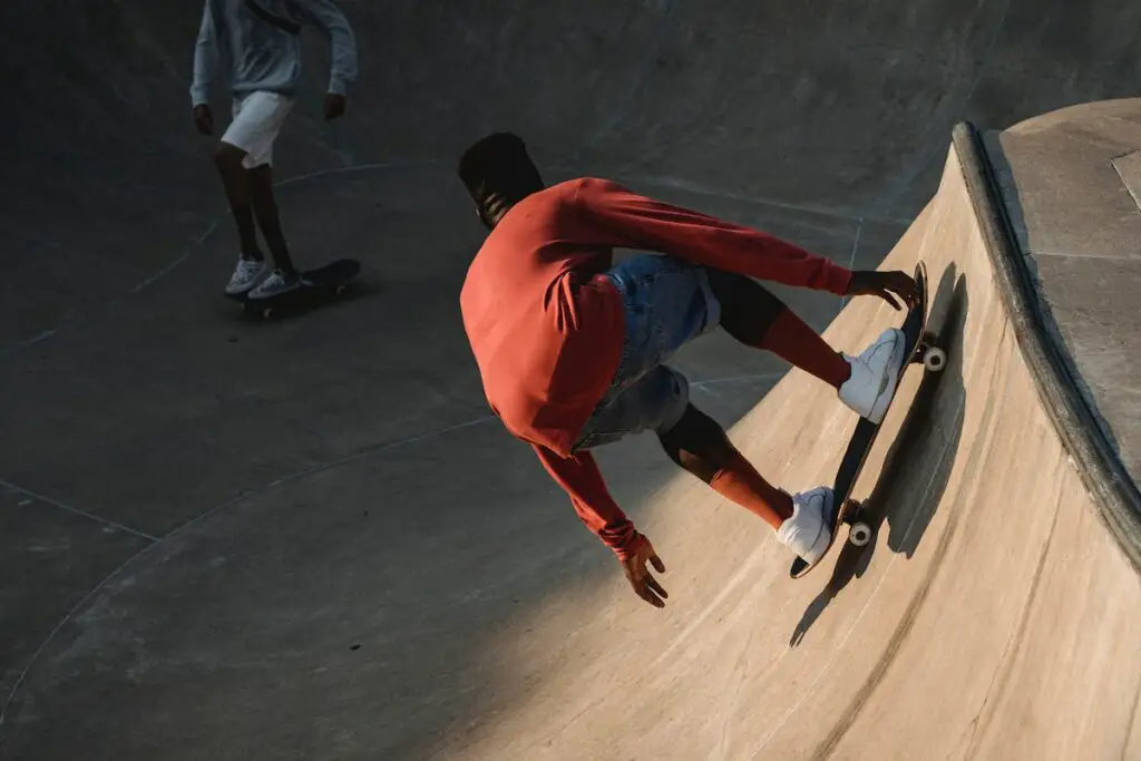 Image of skaters riding skateboards in a skatepark. Source: pexels